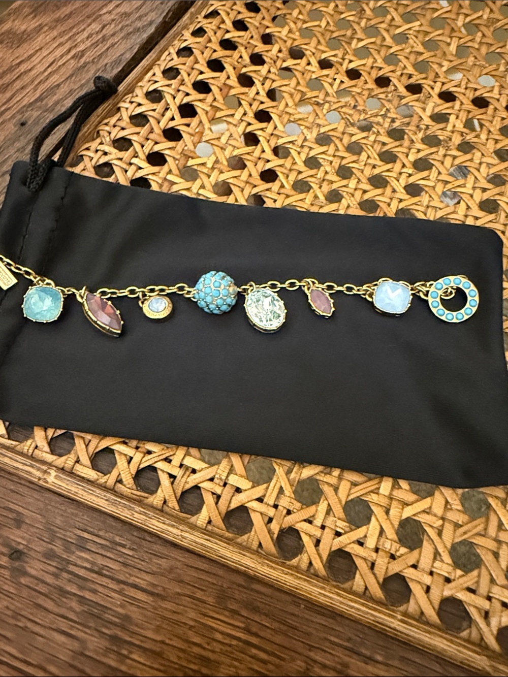 Coach Gold-Tone Charm Bracelet with Turquoise and Pink Accents